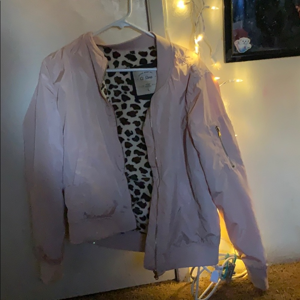pink jacket with fury cheetah print inside